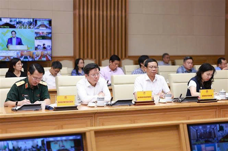 Representatives of ministries and branches attended the 14th meeting of the National Steering Committee on combating illegal fishing. Photo: VNA