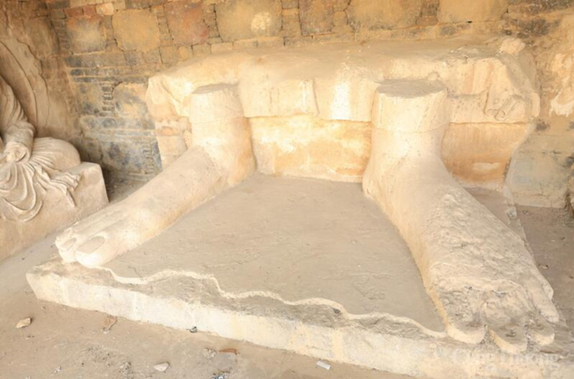The footprint relic of a giant Buddha statue at the Taxila archaeological site.