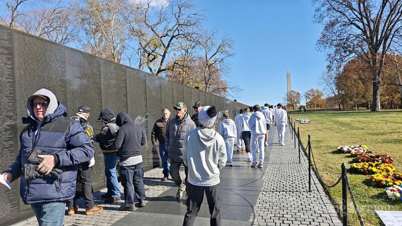 Many attendees gather at the site hours before the ceremony begins.
