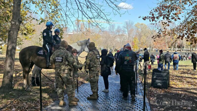 Police and security personnel maintain order at the ceremony.