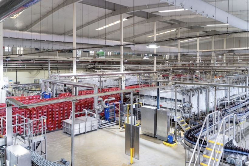 A production line meeting international standards and applying advanced technology at Carlsberg Vietnam’s Phu Bai Brewery.