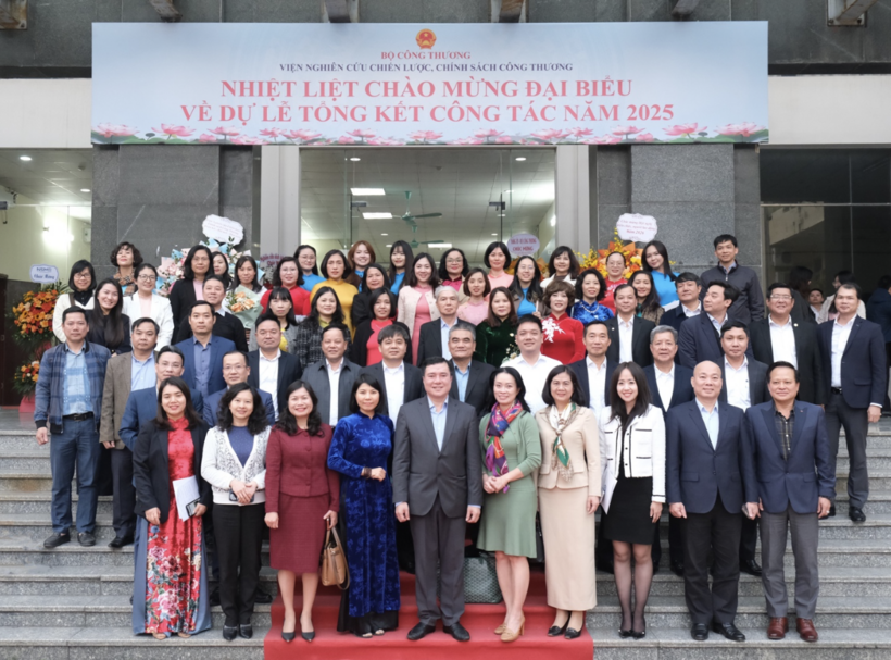 Delegates pose for a group photo at the conference.
