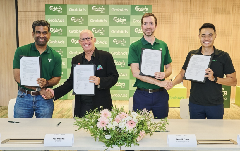 Carlsberg Asia enters a strategic partnership agreement with Grab across four key Southeast Asian markets in 2024; Photo (from left to right): Arindam Varanasi, Vice President, Commercial Asia, Carlsberg; Ken Mandel, Regional Managing Director & Head of GrabAds and Enterprise Customers; Russell Close, Global eCommerce Director, Carlsberg Group; Jerry Lim, Group Managing Director, Regional Head Commercial & Support, Grab Sales & Support.