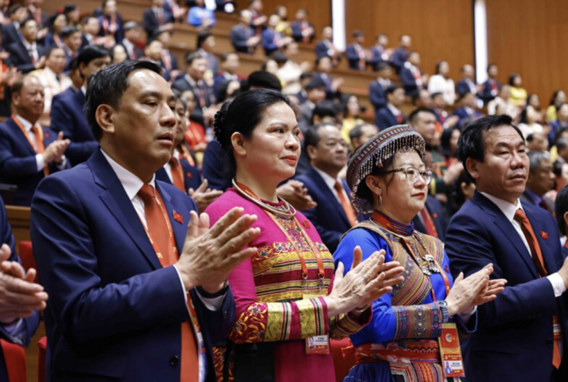 Delegates attend the opening session of the 14th National Congress of the Party. Photo: VNA