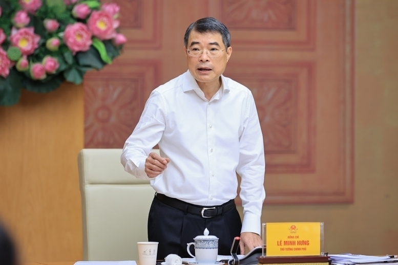 Prime Minister Le Minh Hung chairs a working session with the Ministry of Industry and Trade on the implementation of assigned tasks for 2026. Photo: VGP