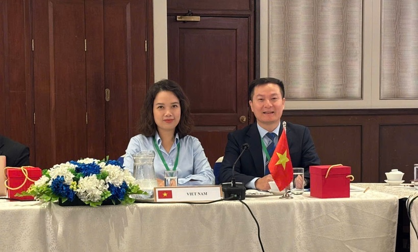 Representatives of the National Competition Commission deliver remarks at the meeting.