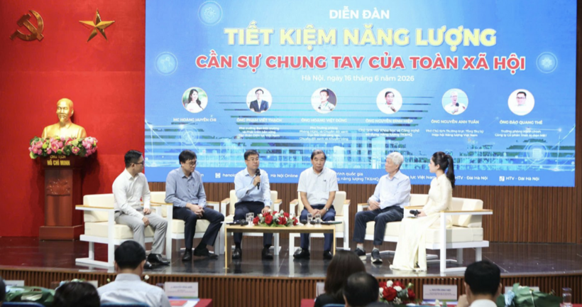 Delegates and guests attend the forum.