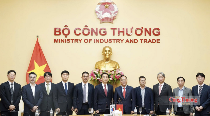 The two sides in a group photo.