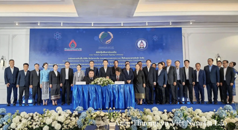 The signing ceremony of the joint venture agreement establishing the Lao State Goods Inspection and Certification Company.