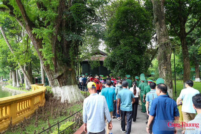 Visitors tour the Stilt House relic site, where President Ho Chi Minh lived and worked during the final 11 years of his life from 1958 to 1969.