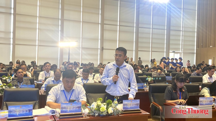 Delegates exchange views and hold discussions at the event.