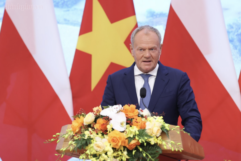 Polish Prime Minister Donald Tusk delivers remarks at the press conference.