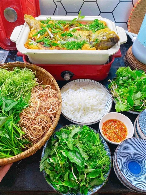 An attractive tray of 'cá chép om dưa'. — Photo banhran.vn An attractive tray of 'cá chép om dưa'. — Photo banhran.vn