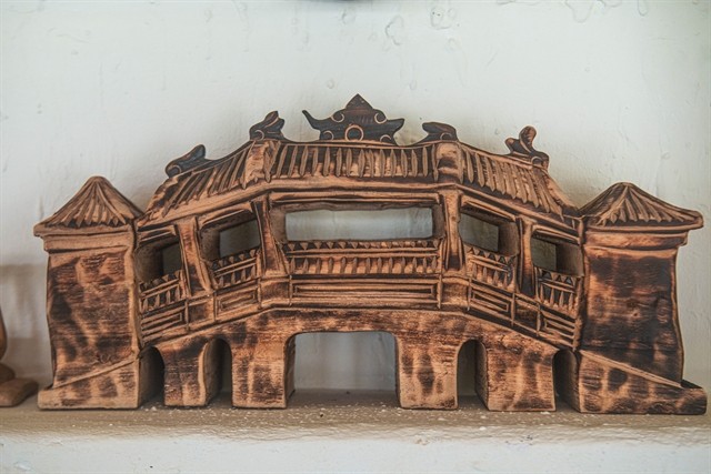 The Japanese Bridge design is created from a log that drifted onto Cửa Đại Beach. Carpenters from Kim Bồng carpentry village in Hội An transformed it. — Photo courtesy of Coco Casa Bar The Japanese Bridge design is created from a log that drifted onto Cửa Đại Beach. Carpenters from Kim Bồng carpentry village in Hội An transformed it. — Photo courtesy of Coco Casa Bar