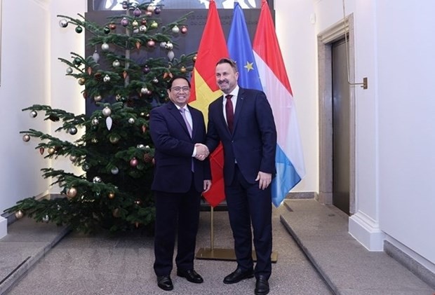 Prime Minister Pham Minh Chinh (L) meets with his Luxembourg counterpart Xavier Bettel on December 9, 2022 during his official visit to the European country. (Photo: VNA) Prime Minister Pham Minh Chinh (L) meets with his Luxembourg counterpart Xavier Bettel on December 9, 2022 during his official visit to the European country. (Photo: VNA)