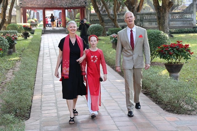 Norwegian Ambassador to Việt Nam Hilde Solbakken and her husband and daughter visit the Literature Temple in Hà Nội in the Lunar New Year 2023. Photo courtesy of the embassy Norwegian Ambassador to Việt Nam Hilde Solbakken and her husband and daughter visit the Literature Temple in Hà Nội in the Lunar New Year 2023. Photo courtesy of the embassy