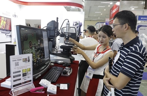 A booth at the 10th Vietnam - Japan Supporting Industry Exhibition (SIE) which opened in the capital city on August 9. (Photo: VNA)