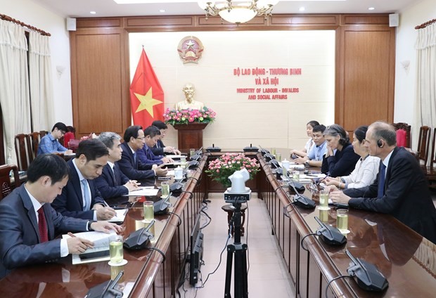 An overview of the meeting between Minister of Labour, Invalids and Social Affairs Dao Ngoc Dung and UNDP Resident Representative in Vietnam Ramla Al Khalidi (Photo: molisa.gov.vn)
