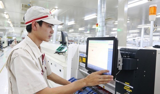 Production activities at UMC Vietnam Electronics Co., Ltd  - a FDI enterprise in Tan Truong Industrial Park in Hai Duong province (Photo: sggp.org.vn)