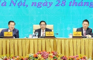 PM urges efforts to upgrade stock market to emerging status