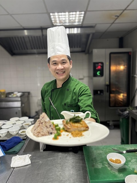 Chef Doãn Văn Tuấn serves a dish with Nam Ô village fish sauce at Furama resort's kitchen. It's the first time a locally-made fish sauce is used at a luxury resort. Photo courtesy of Doãn Văn Tuấn Chef Doãn Văn Tuấn serves a dish with Nam Ô village fish sauce at Furama resort's kitchen. It's the first time a locally-made fish sauce is used at a luxury resort. Photo courtesy of Doãn Văn Tuấn