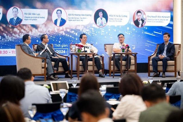 Delegates discuss Vietnamese economic prospects at the policy dialogue held by Việt Nam Institute for Economics and Policy Research on Friday in Hà Nội. — VNS Photo