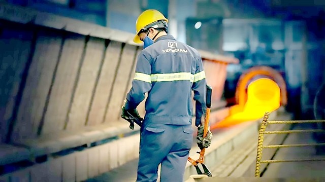A worker at the Southern Steel Company. The local steel industry is expected to expand this year. — VNA/VNS Photo
