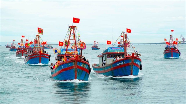 A sea parade of fishing boats seen at the Yên Lương Temple Festival in Cửa Lò Town, Nghệ An Province. The festival has been recognised as National Intangible Heritage by the Ministry of Culture, Sports and Tourism in 2023. Photo nhiepanhdoisong.vn