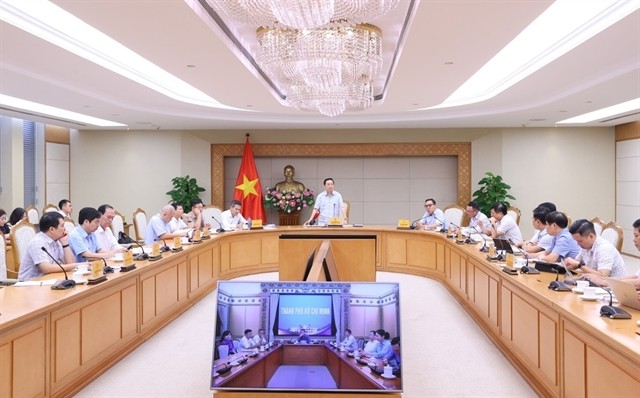 Deputy Prime Minister Trần Hồng Hà chairs the meeting on Tuesday. — VNA/VNS Photo Văn Điệp