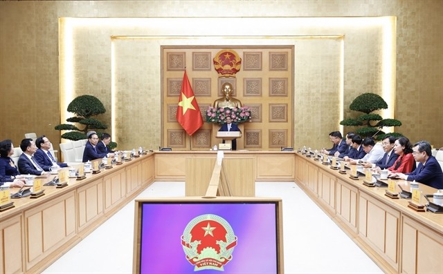 Prime Minister Phạm Minh Chính at the meeting on Monday to congratulate and assign tasks to newly-appointed Deputy Prime Ministers and ministers. — VNA/VNS Photo Dương Giang