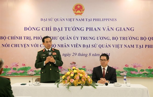 General Giang speaks in the meeting on Friday. — VNA/VNS Photo
