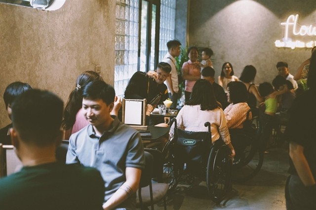 HOT SPOT: The cafe has been a rendezvous for hearing-impaired people. VNS Photo Thu Trang HOT SPOT: The cafe has been a rendezvous for hearing-impaired people. VNS Photo Thu Trang