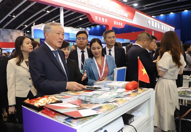 Permanent Deputy Prime Minister Nguyễn Hòa Bình at Việt Nam's exhibition booth at the Belt and Road Summit 2024.