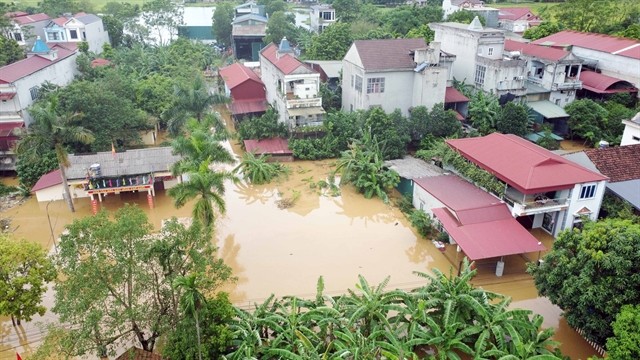 Hundreds of households in Cẩm Khê District, Phú Thọ Province, submerged in water due to the Typhoon Yagi. — VNA/VNS Photo Hundreds of households in Cẩm Khê District, Phú Thọ Province, submerged in water due to the Typhoon Yagi. — VNA/VNS Photo