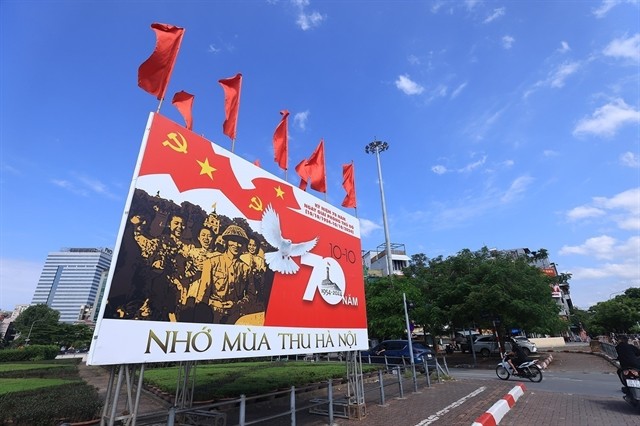 Another poster at Giải Phóng-Đại Cồ Việt Intersection which reads 'Nostalgia for Hà Nội's autumn'. Another poster at Giải Phóng-Đại Cồ Việt Intersection which reads 'Nostalgia for Hà Nội's autumn'.