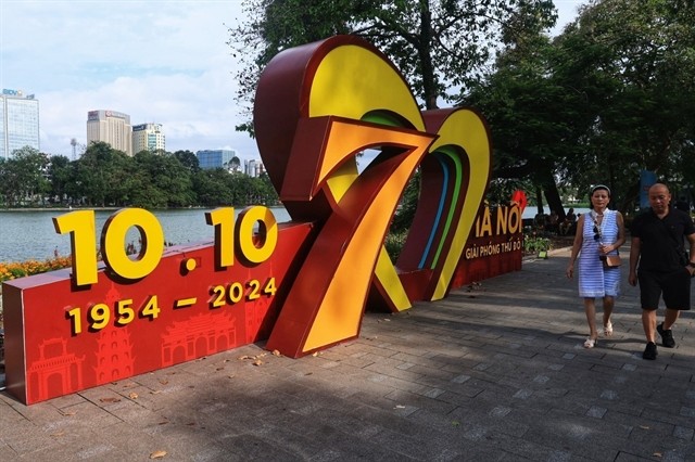 A structure celebrating the Liberation Day set up close to a lake. A structure celebrating the Liberation Day set up close to a lake.