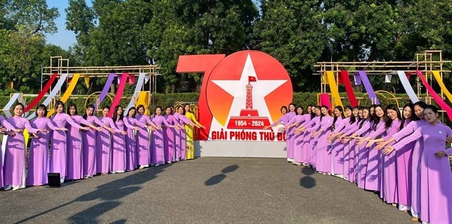 A dance performance and Áo Dài carnival titled