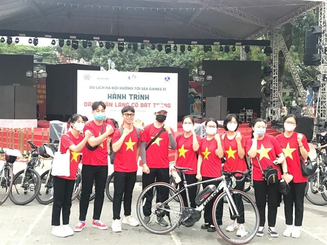 Taking part in the biking tour, 'Footprints of Bát Tràng ancient village'.