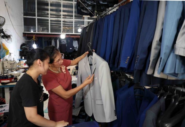 Suits produced in the tailoring craft village of Từ Thuận Hamlet, Vân Từ Commune. — VNS Photo