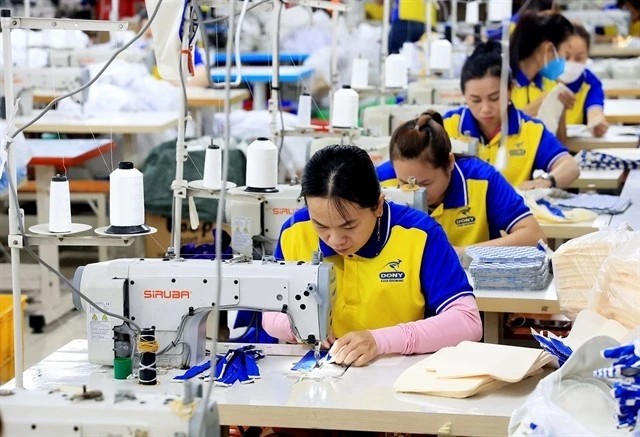 Workers at a garment company in HCM City. (Photo: VNA)