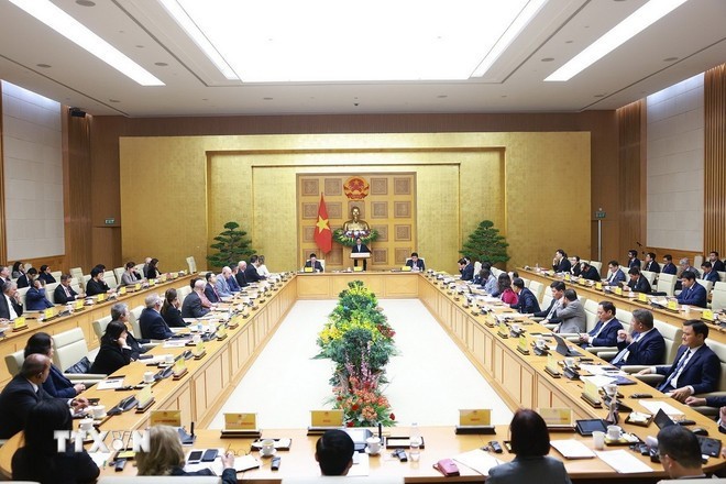 Prime Minister Pham Minh Chinh chairs meeting with representatives from US businesses (Photo: VNA)