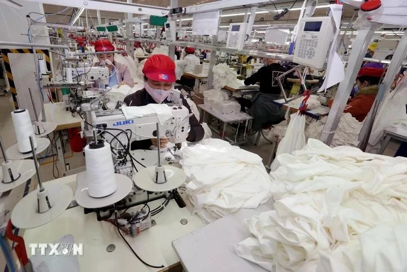 Garment production for export at the Tinh Loi Garment Company in Hai Duong province. (Photo: VNA)